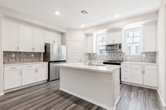 Building Photo - Brand-new must-see 3-bedroom townhome near...