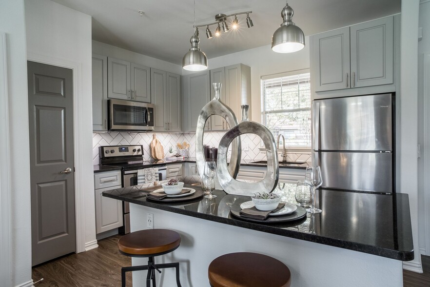 Newly Renovated Apartment Homes with Stainless Steel Appliances - Attiva Pearland 55+ Active Living