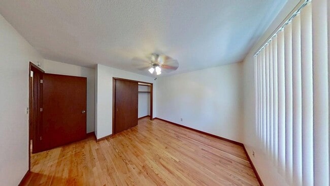 Building Photo - Updated two bedroom duplex, new stainless steel appliances, garage, and hardwood floors