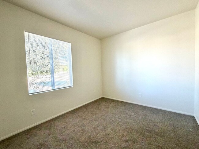 Building Photo - Energy Efficient 5 Bedroom Home with Paid Solar & Covered Patio