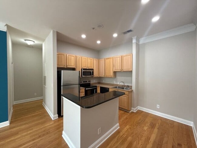 Building Photo - Condo in First Ward - T.R. Lawing Realty P...