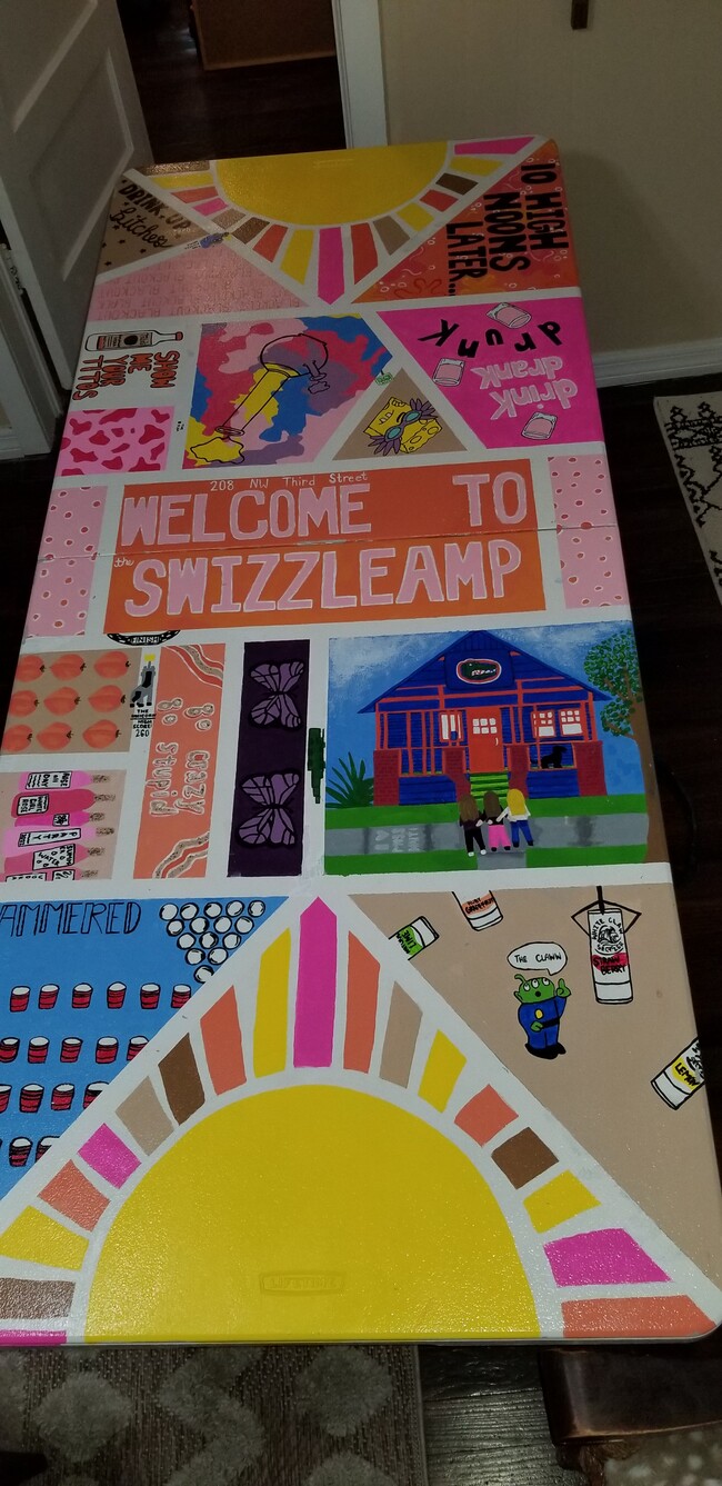 Game table painted by our tenants. - 208 NW 3rd St