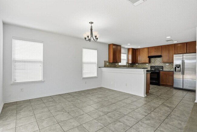 Building Photo - Spacious 4-Bedroom Home with Flexible Floor Plan in Growing West San Antonio