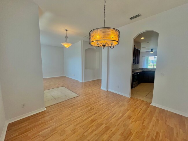 Building Photo - Spacious 4-Bed, 3-Bath Home in Guard-Gated...