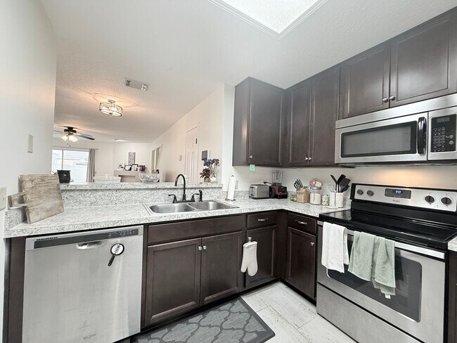 Building Photo - Peaceful Townhome in Fort Caroline with Fu...
