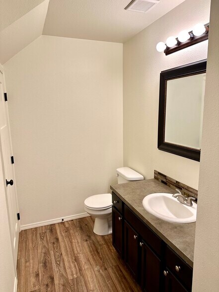 1/2 bath downstairs for guests - 1747 Vela Ln SW