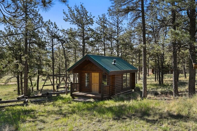 Building Photo - 3 bed 2 Bath Log Home on 2 Acres in Florissant