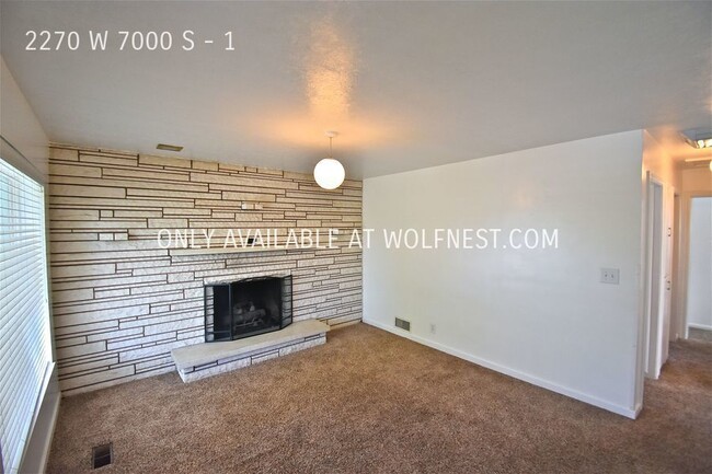 Building Photo - Lovely 2 Bedroom West Jordan Unit! No Depo...