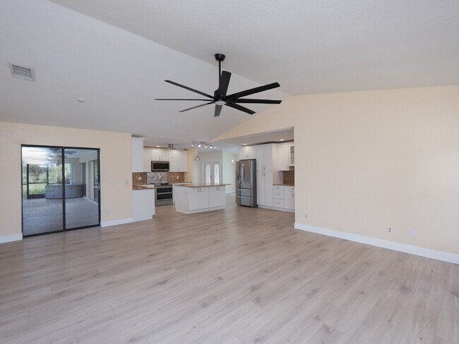 Building Photo - 3 BEDROOM • 2 BATHROOM • PRIVATE POOL • WATERFRONT • BOAT LIFT • ZERO DEPOSIT MOVE-IN AVAILABLE