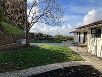 Building Photo - 3 bedroom, 3 bath hilltop oasis overlookin...