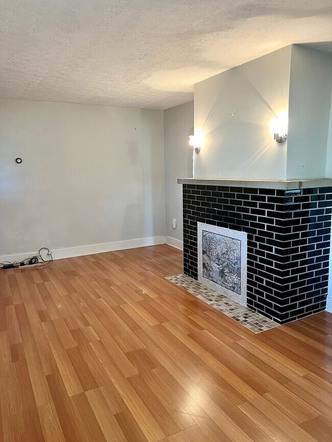 Building Photo - Country living! 1st floor laundry 3+ car garage with work shop