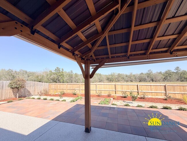 Building Photo - Custom-crafted details shine throughout this stunning 3-bedroom home in Magnolia at the Bluffs in...