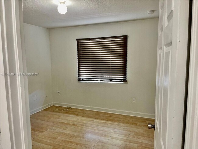 Building Photo - 5857 NW 13th Ave