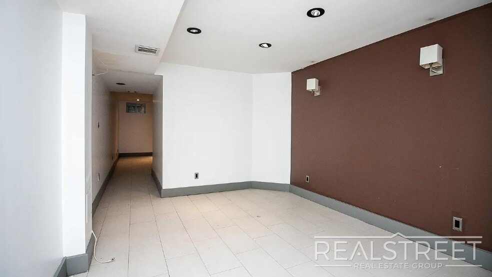 Building Photo - Gut-Renovated 3BR + Massive Finished Basement | Backyard, Laundry & HVAC | Bushwick