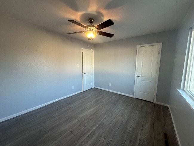 Building Photo - Centrally Located 2 BR Green Townhome with Fenced Patio