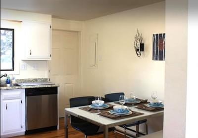 Kitchen with door to back deck - 1228 Maple Street