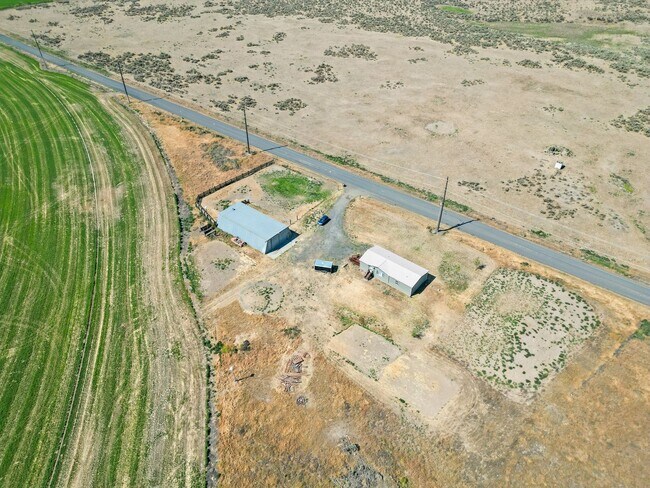 Building Photo - Country Living with a Huge Shop - 3BR on Acreage, Livestock Welcome!