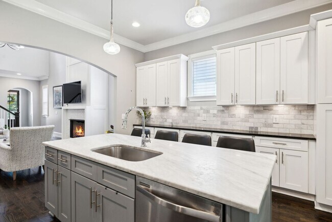 Building Photo - Welcome to this beautifully designed 4-bed...