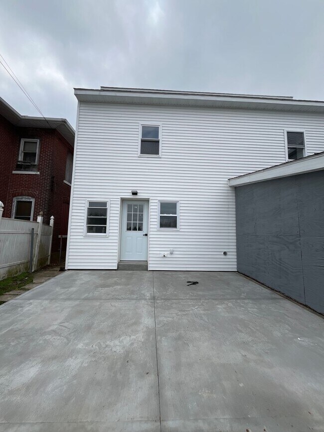 Building Photo - A real stunner! The full renovation is the first thing you'll notice..