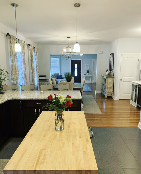 Open floor plan from kitchen, to dining room, to living room. - 74 Peters Pl