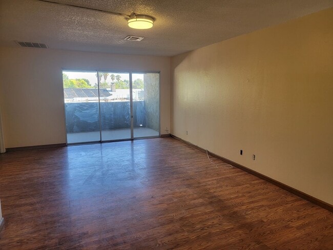 Building Photo - 1773 E Harmon Ave