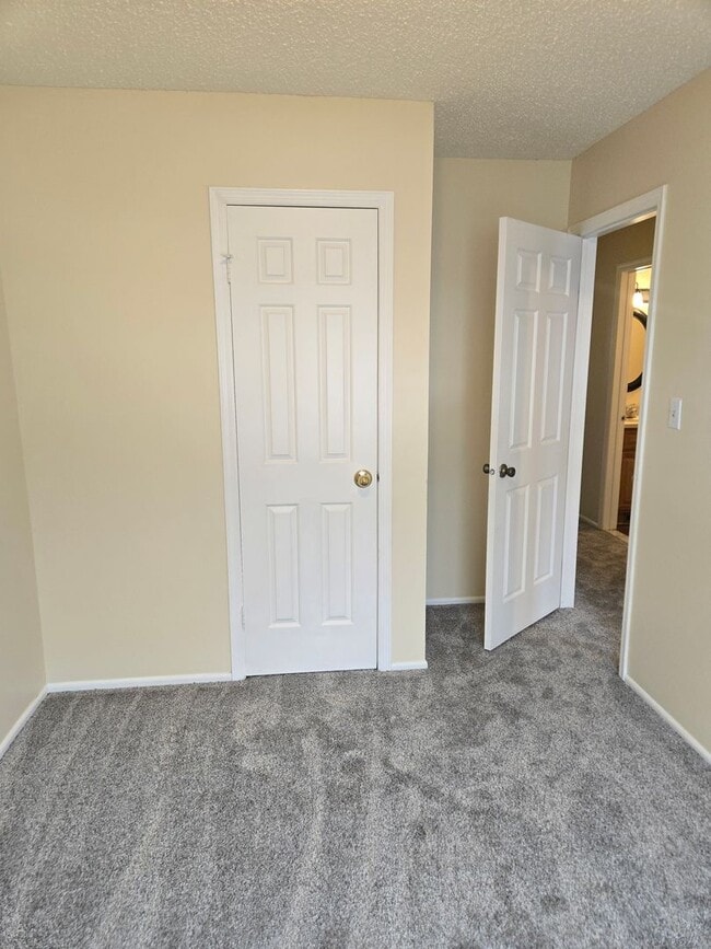 Building Photo - Recently painted & carpeted townhouse with 1,200+ SQ FT, 3-bedroom, 2.5 bathroom and lots of amen...