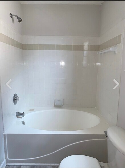 Shower head to be updated. New tile flooring in the bathrooms - 3001 Hamilton Church Rd