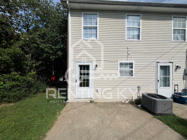 Building Photo - Updated 2-Bed, 1.5-Bath Townhome with a Ga...
