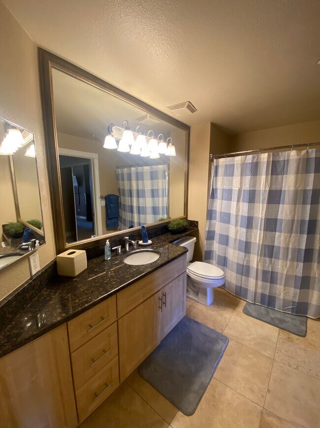 Building Photo - Fully furnished top floor strip view condo at the fabulous Meridian