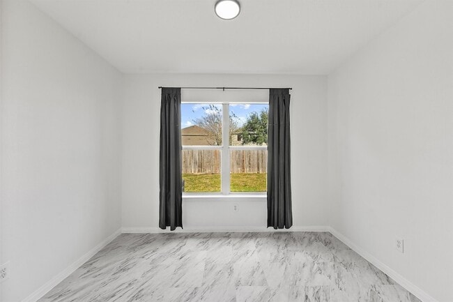 Building Photo - 7010 Dahlia Rd