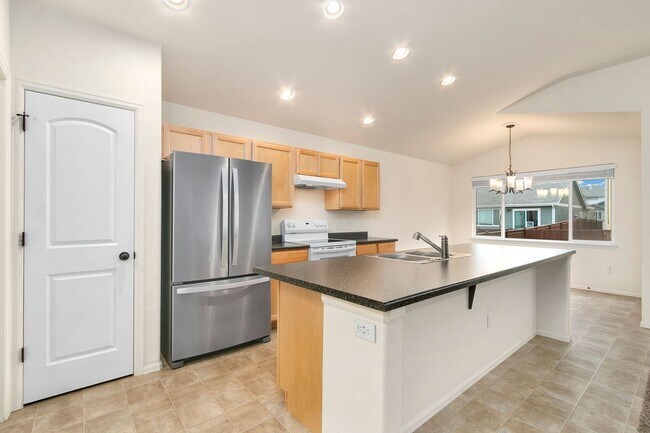 Building Photo - RainDance Resort-Style Living with 5 Bedroom, 3 Bathroom Ranch Home!