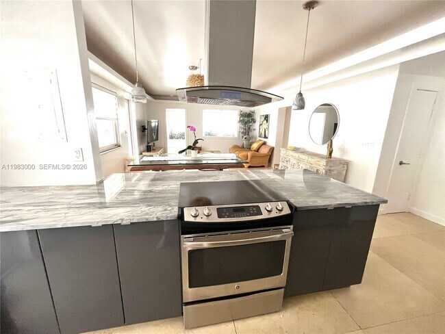 Building Photo - 10190 Collins Ave