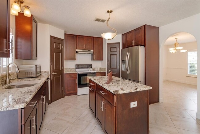 Building Photo - Comfort Meets Style in This Spacious Corner-Lot Home with Bonus Flex Room