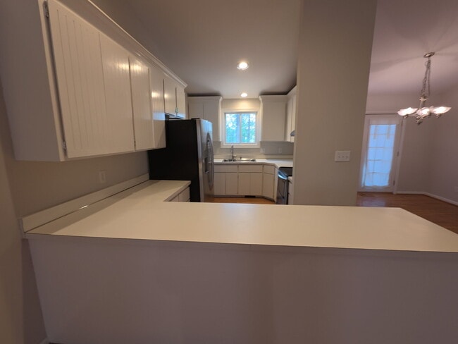 Building Photo - Terrific Rancher with Vaulted Ceiling in Meredith Woods.