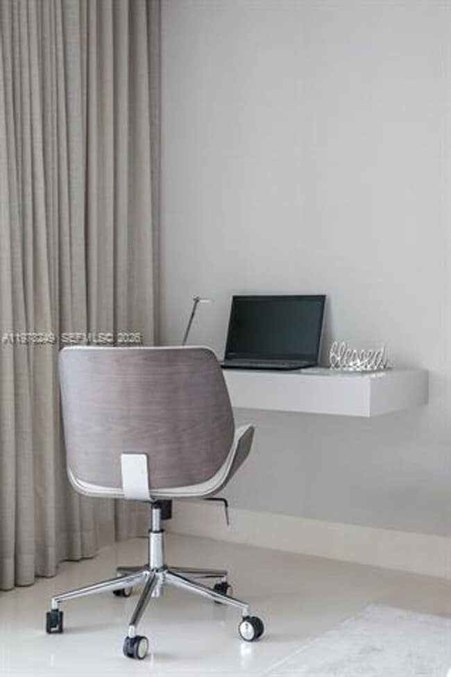 Building Photo - 10201 Collins Ave