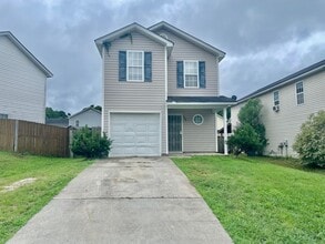 Building Photo - Welcome to this beautiful 4-bedroom, 2.5-b...