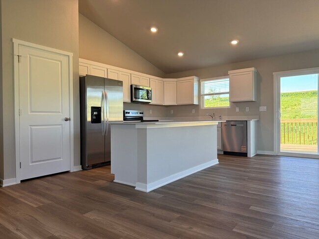 Building Photo - Spacious 4-Bedroom Split-Level Near Standing Bear Lake & Trails