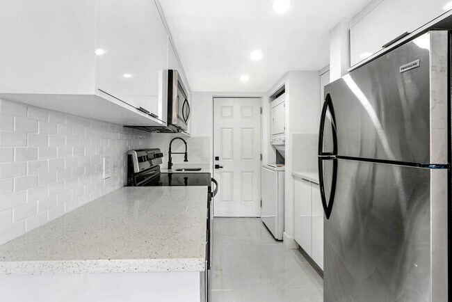Building Photo - Live in this newly renovated two-story cor...
