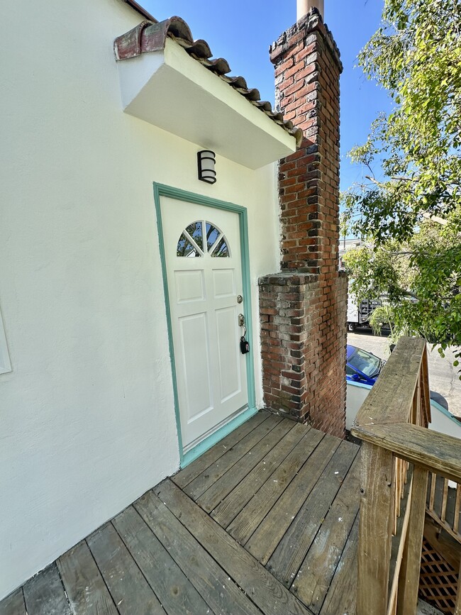 2nd floor Entrance with a deck - 2643 Highland Ave