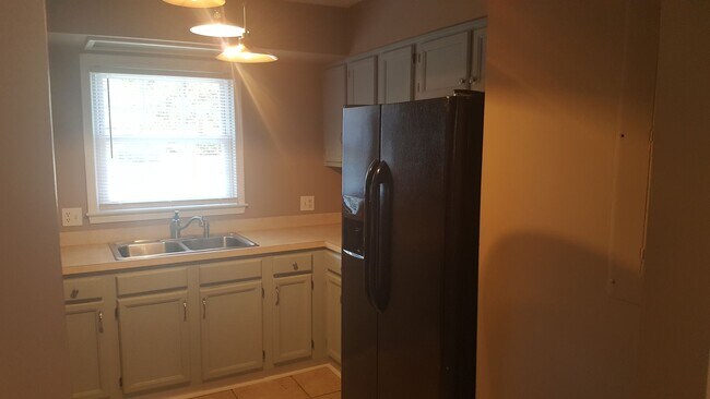 Building Photo - Large Townhome on 44th Avenue