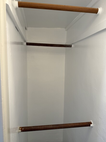 4 clothes racks / closet - 8252 Rees St