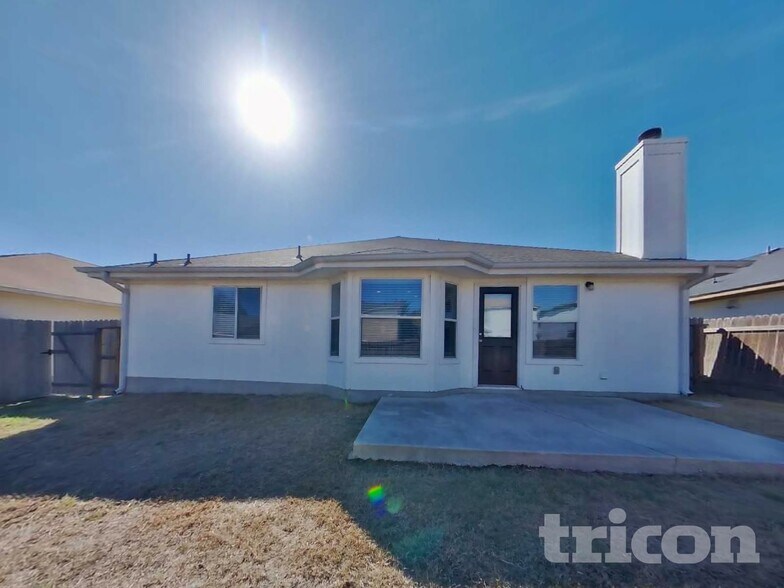 Building Photo - 4842 Dahlia Terrace