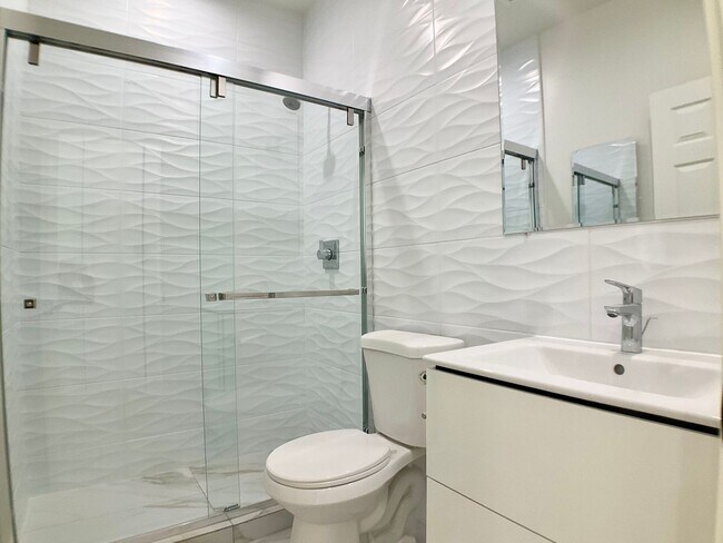 Building Photo - Lowered Price! FULLY Remodeled. BRIGHT! In-Unit W/D, Stainless Appliance Package, MODERN!