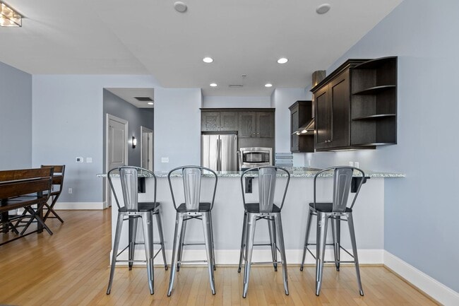 Building Photo - Modern 1-Bedroom with Downtown Raleigh Skyline Views