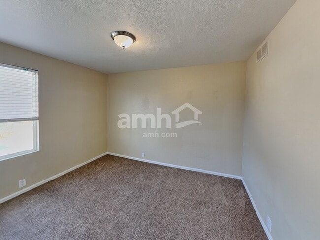 Building Photo - 15625 E 99th Ave