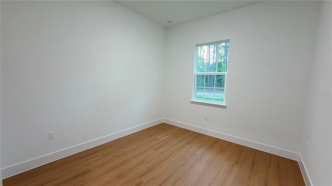 Building Photo - 7250 N Freeport Cir