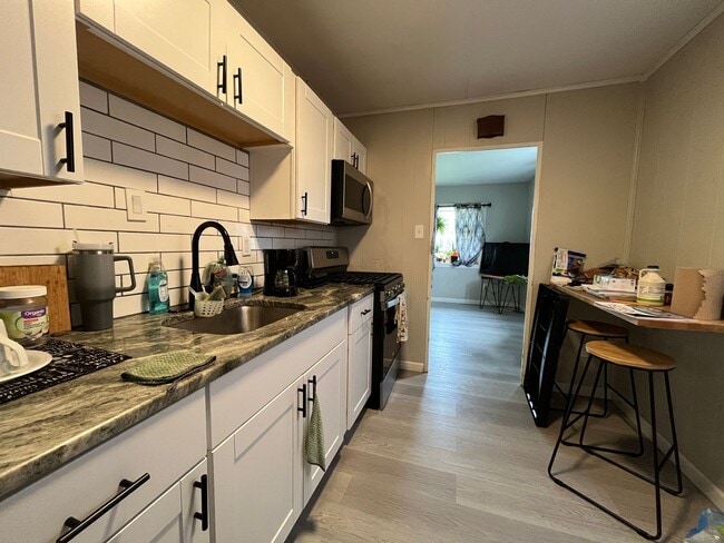 Building Photo - A newly remodeled 2-bedroom, 1-bathroom ranch home with central air and gas heat in a fantastic l...
