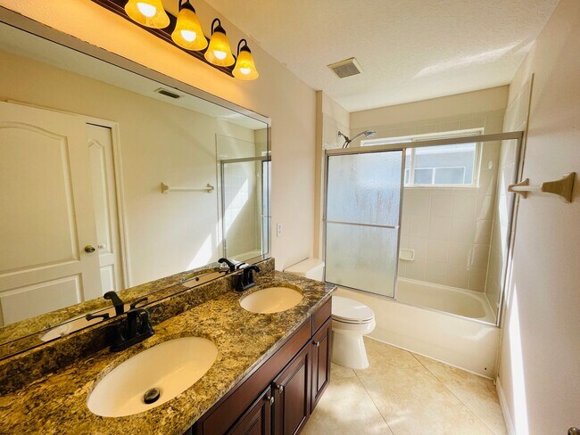 Building Photo - Available now! Charming 4-bedroom, 2.5-bathroom pet friendly home!!