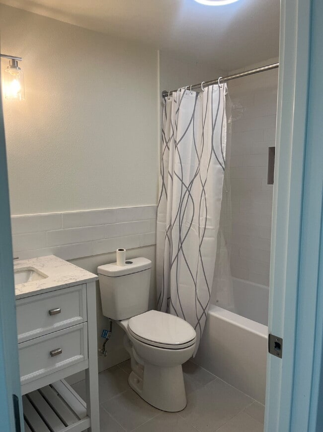 Building Photo - "Charming 4-Bedroom Coastal Retreat with 2 Baths"