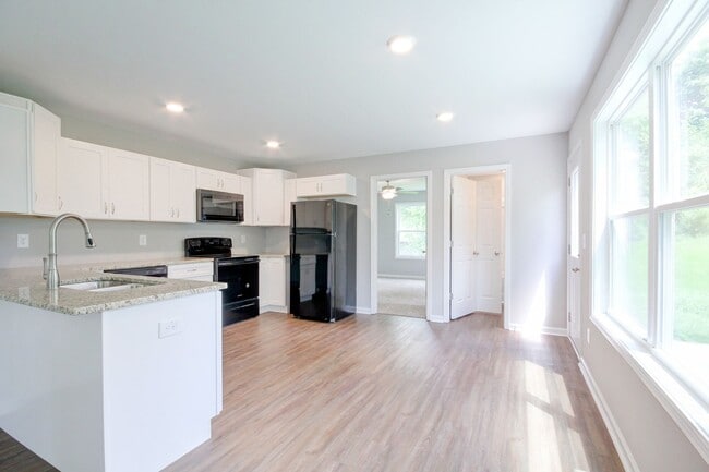 Building Photo - Two Story Duplex With Hardwood Flooring an...